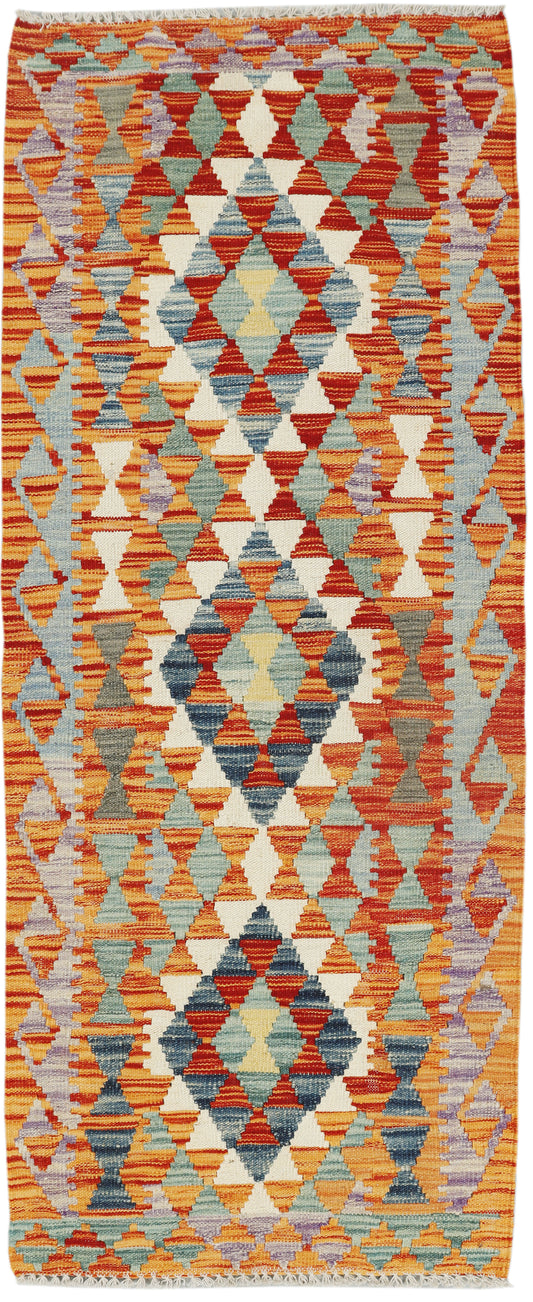 Afghan Kilim runner rug by eastofhere, 190x73cm, featuring traditional geometric patterns in vibrant colors on a woven textile.