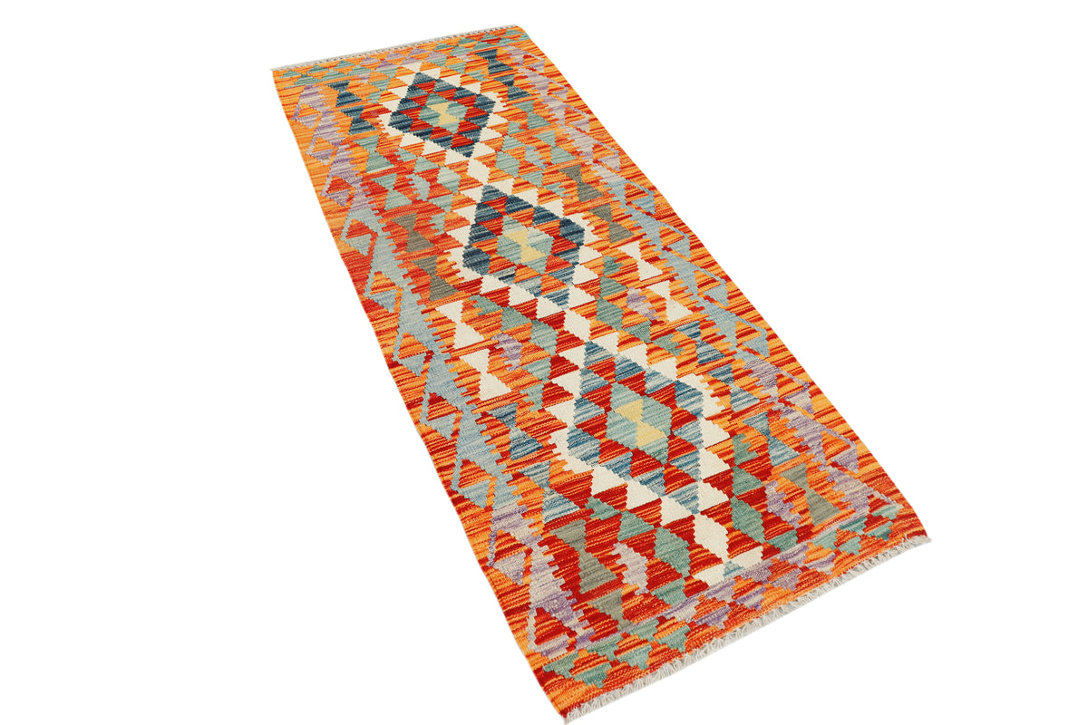 Afghan Kilim rug runner by eastofhere, 190x73cm, featuring traditional geometric patterns in vibrant colors.