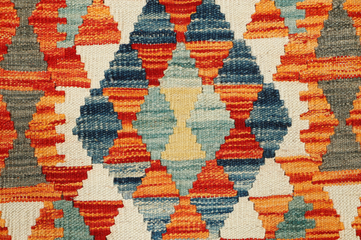 Afghan Kilim Runner rug by eastofhere, 190x73cm, featuring traditional geometric patterns and vibrant colors on a woven surface.