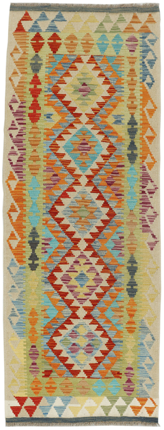 Afghan Kilim rug runner by eastofhere, 194cm long and 72cm wide, featuring traditional geometric patterns and vibrant colors.