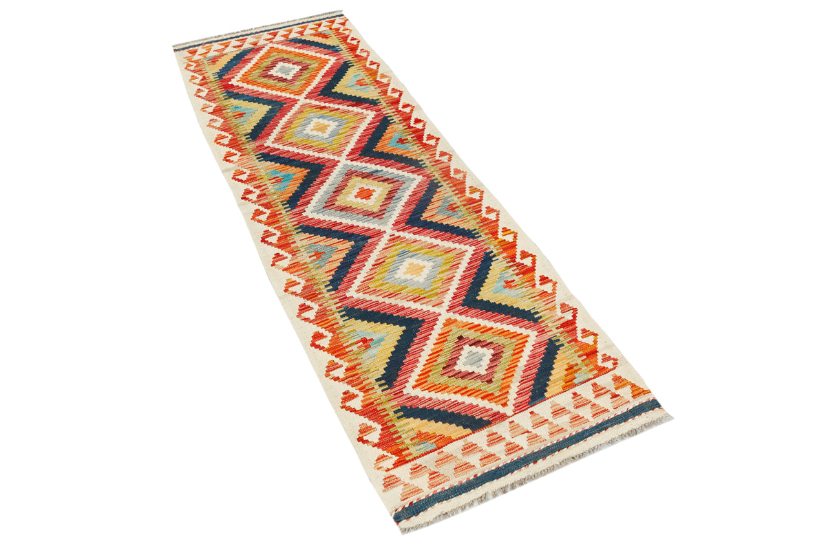 Afghan Kilim runner rug by eastofhere, 197x68cm, featuring traditional geometric patterns in vibrant colors.