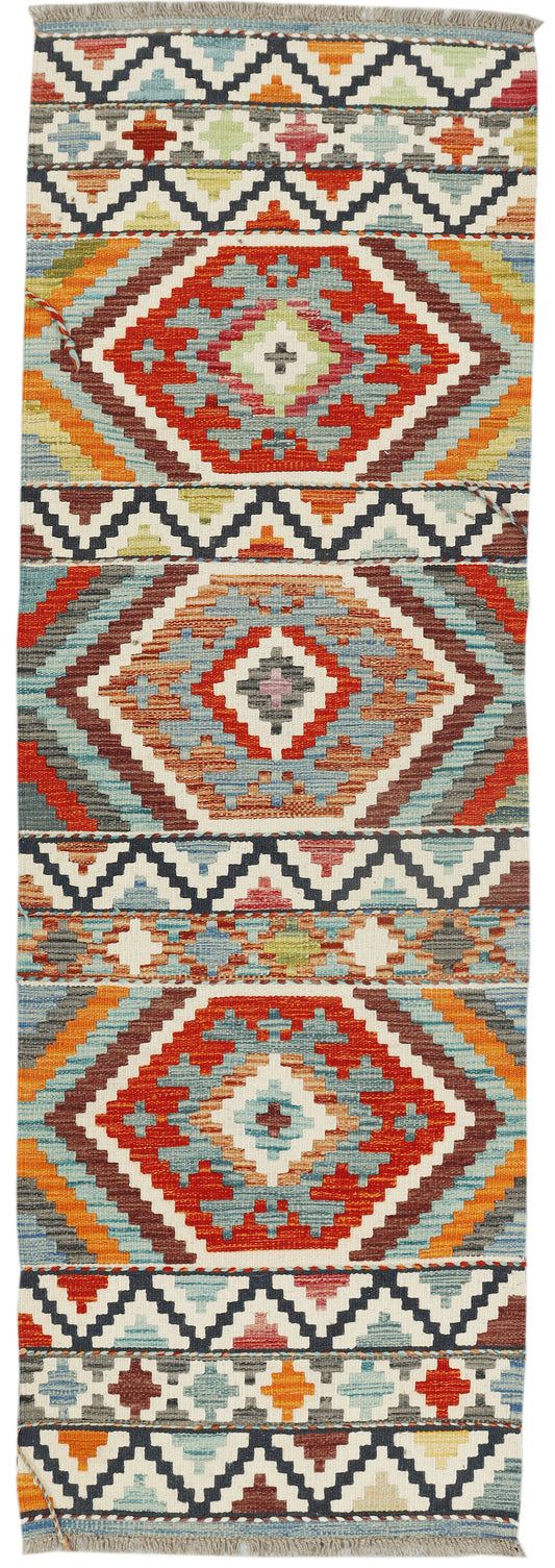 Afghan Kilim runner rug by eastofhere, 196 x 63cm, featuring traditional woven geometric patterns in vibrant colors.