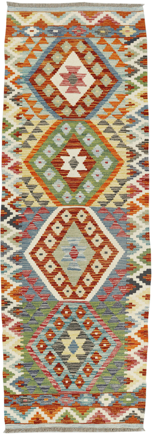 Afghan Kilim runner rug by eastofhere, 192x64cm, featuring traditional geometric patterns and vibrant earthy colors.