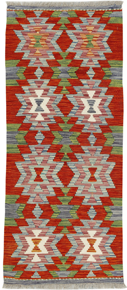 Afghan Kilim Runner rug in 138x57cm with colorful geometric patterns, handcrafted by eastofhere.
