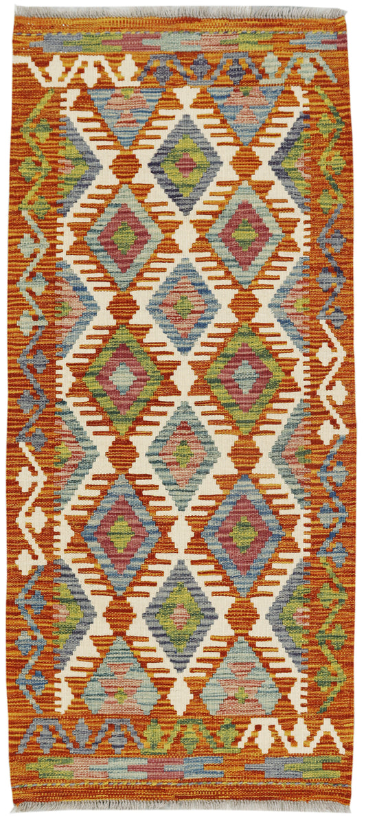 Afghan Kilim runner rug by eastofhere, 143x62cm, featuring traditional geometric patterns and vibrant colors on woven textile.