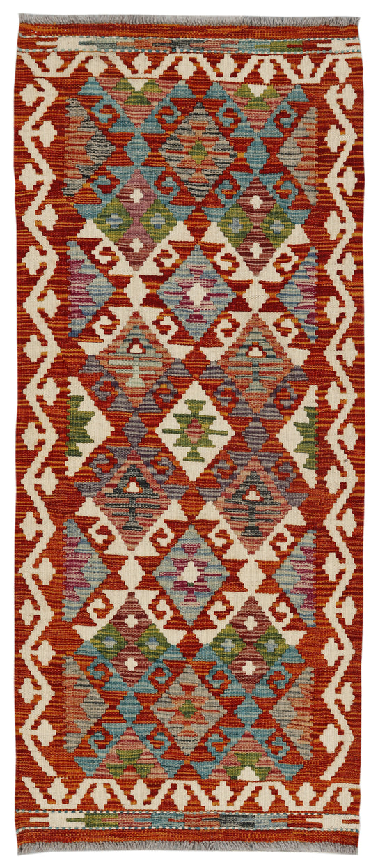 Afghan Kilim runner rug by eastofhere, 146 x 62cm, with vibrant traditional geometric patterns and woven textile textures.