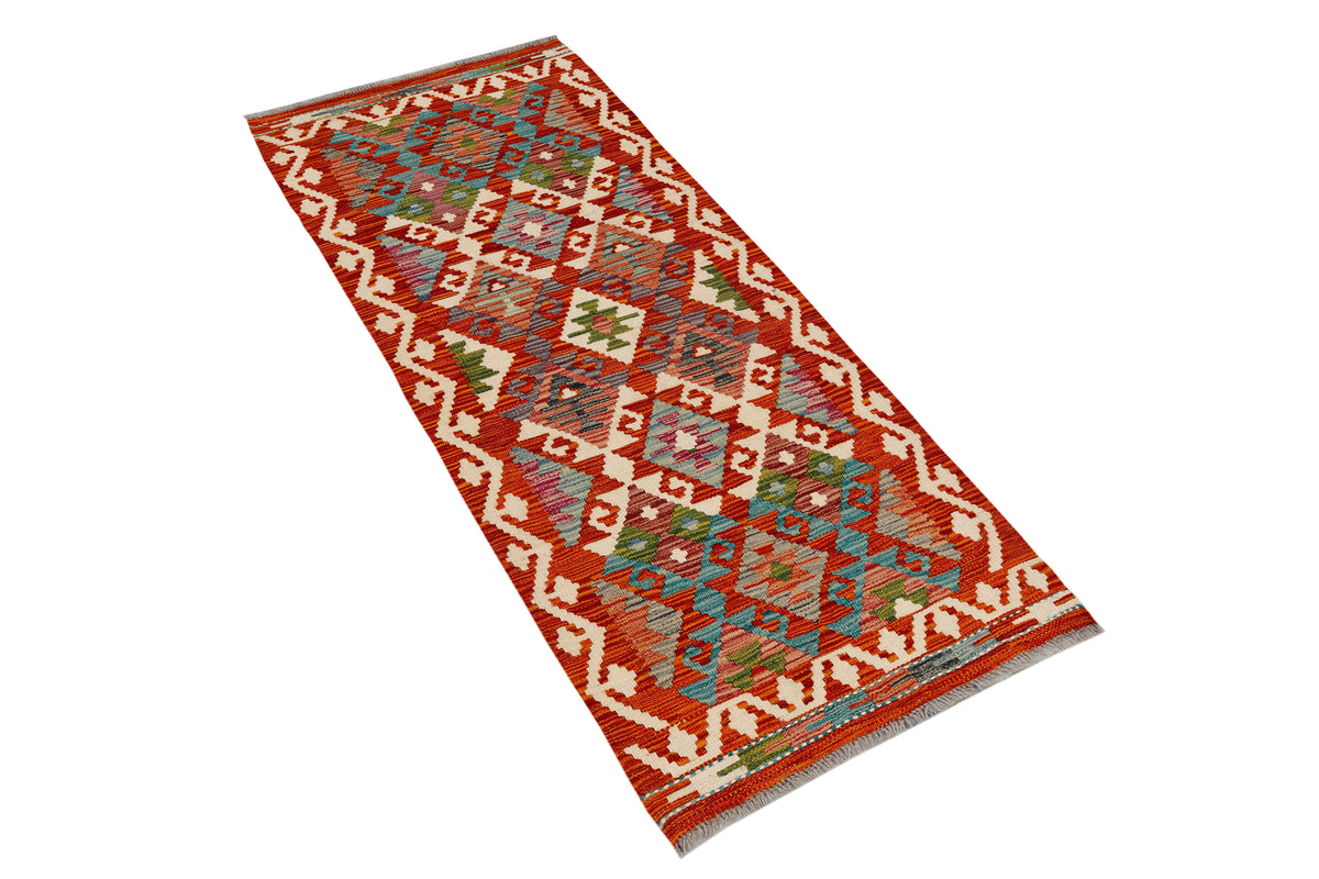 Afghan Kilim runner rug by eastofhere, 146x62cm with colorful geometric patterns and traditional woven design.
