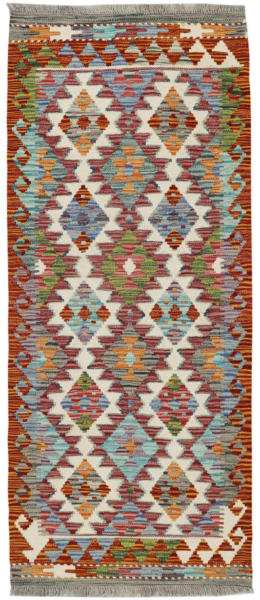 Afghan Kilim rug runner by eastofhere, 148x62cm, featuring traditional geometric patterns in vibrant colors.