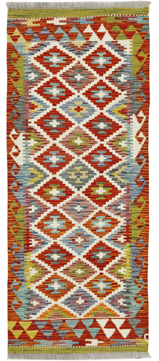Afghan Kilim runner rug by eastofhere, 149x61cm with colorful geometric patterns on woven textile.