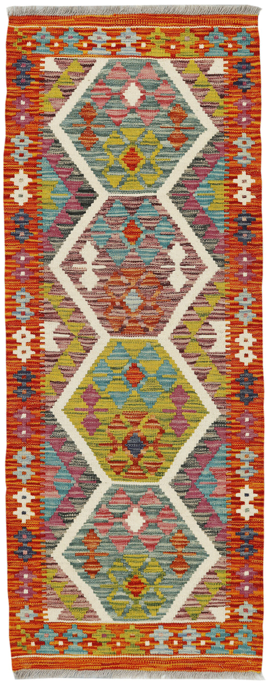 Afghan Kilim runner rug by eastofhere with geometric patterns in warm earthy tones, measuring 155x59cm.