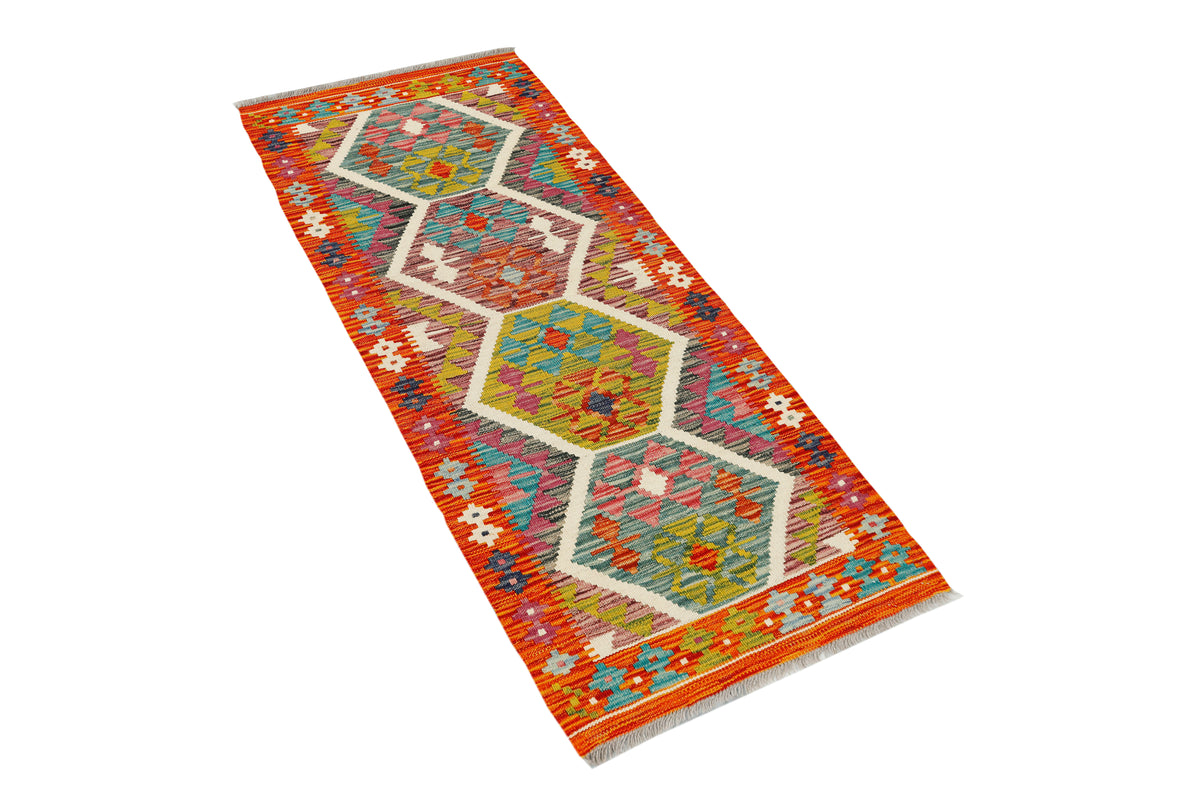 Afghan Kilim runner rug by eastofhere, 155x59cm, featuring traditional geometric patterns in vibrant colors.