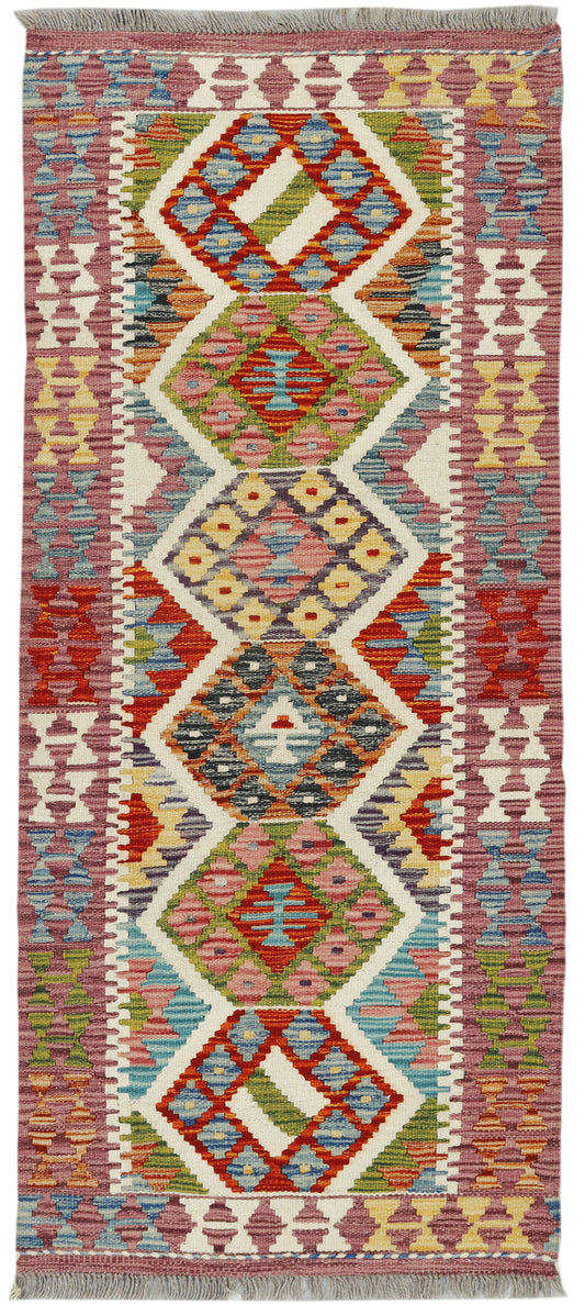 Afghan Kilim runner rug by eastofhere, 145cm long and 62cm wide, with traditional geometric patterns and vibrant colors.