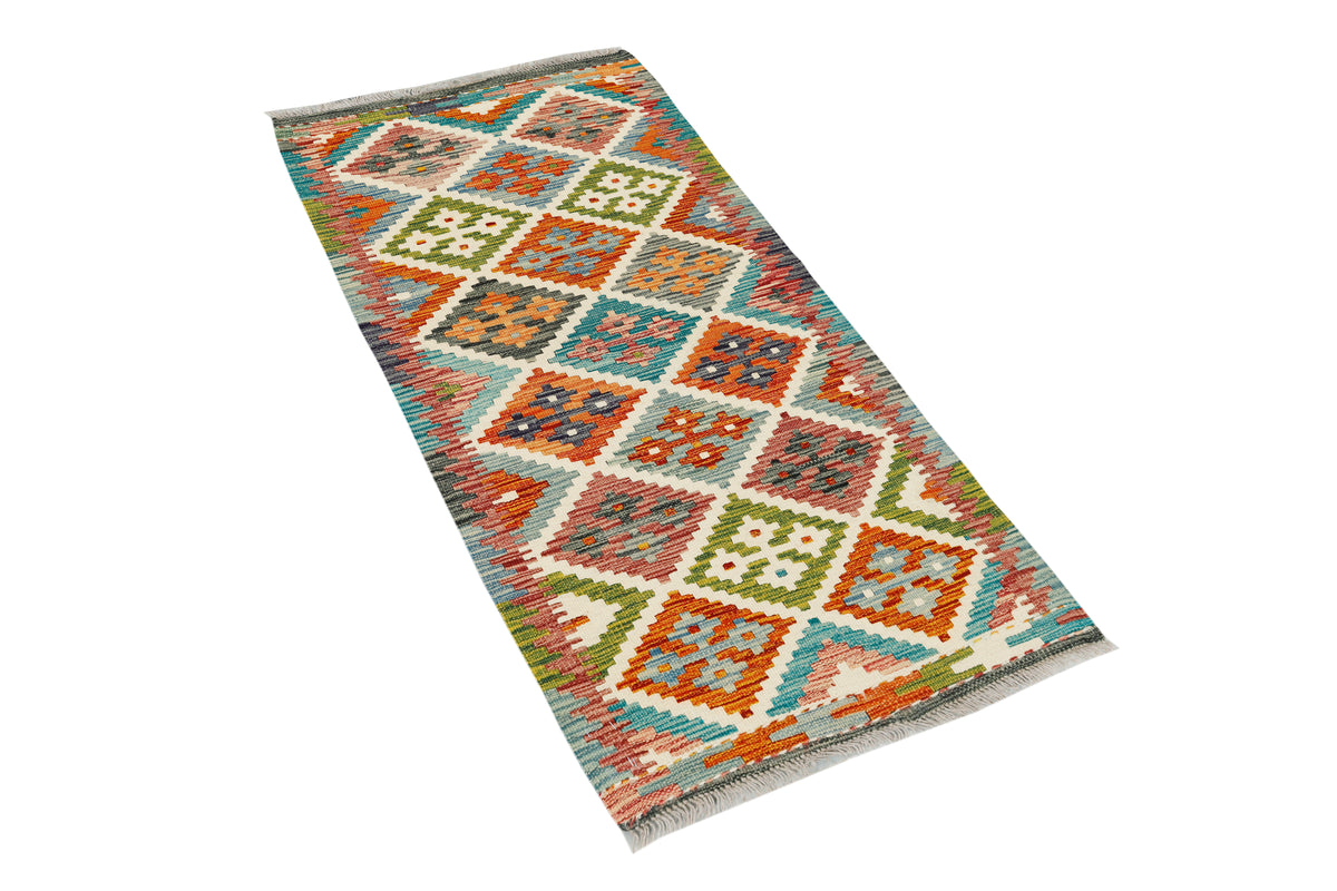Afghan Kilim runner rug by eastofhere, 141cm long and 62cm wide, showcasing intricate geometric patterns in vibrant colors.