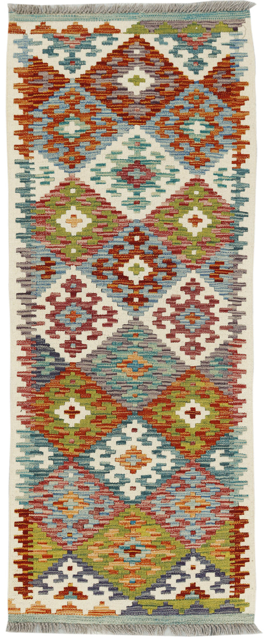Afghan Kilim runner rug by eastofhere, 151cm long and 58cm wide, featuring traditional geometric patterns in vibrant colors.