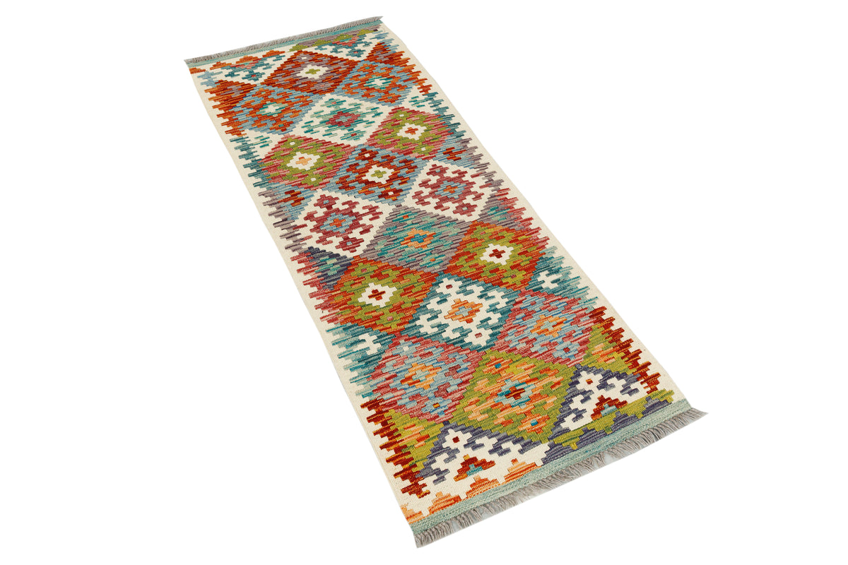 Afghan Kilim rug runner by eastofhere, 151x58cm, featuring traditional geometric patterns and vibrant woven textures.