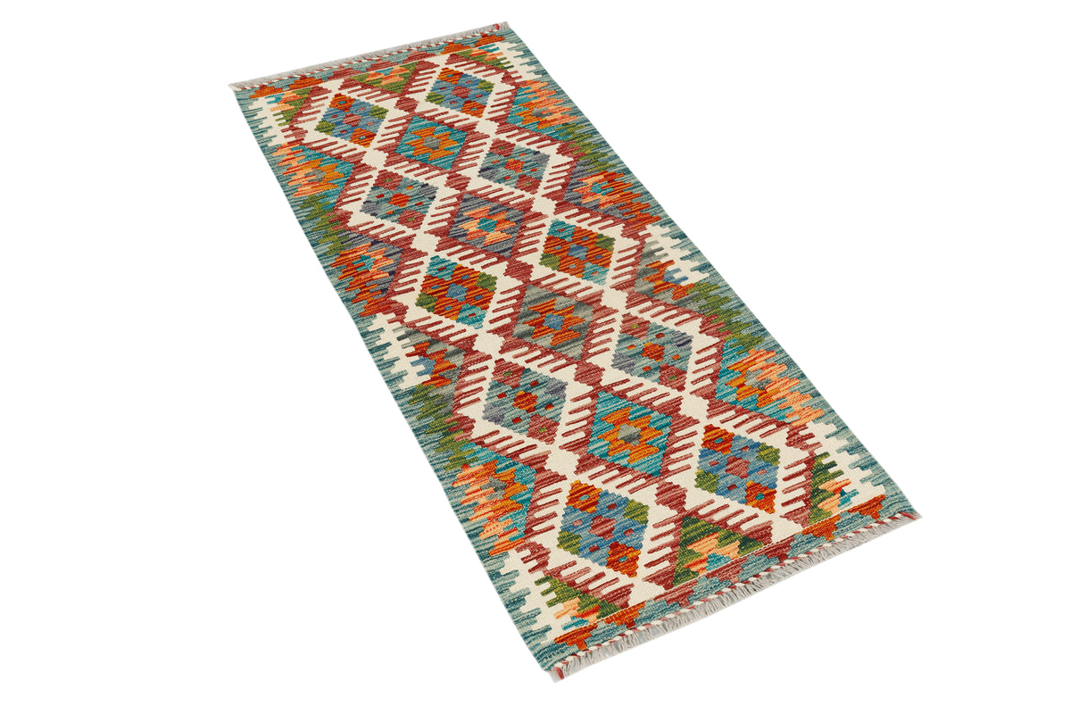 Afghan Kilim runner rug by eastofhere featuring geometric patterns in vibrant colors, measuring 141 x 63 cm.