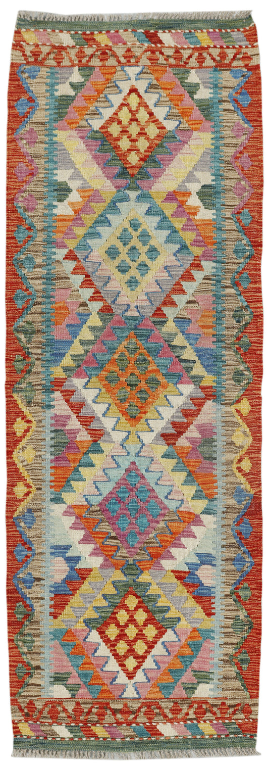 Afghan Kilim runner rug by eastofhere, 200x67cm, featuring traditional geometric patterns in vibrant colors.