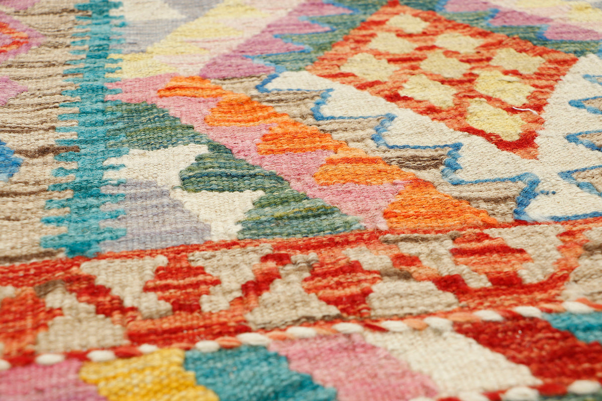 Afghan Kilim runner rug by eastofhere, 200cm long and 67cm wide, featuring traditional geometric patterns and vibrant colors.
