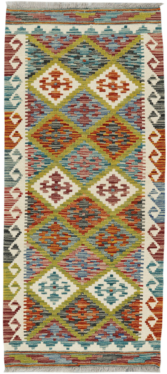 Afghan Kilim runner rug by eastofhere, 149x65cm with vibrant geometric patterns and traditional woven design.