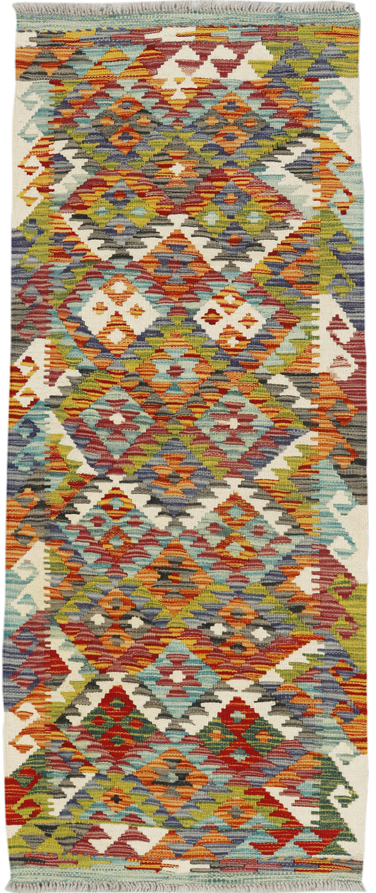 Afghan Kilim runner rug by eastofhere, 145x59cm, featuring traditional geometric patterns in vibrant colors.