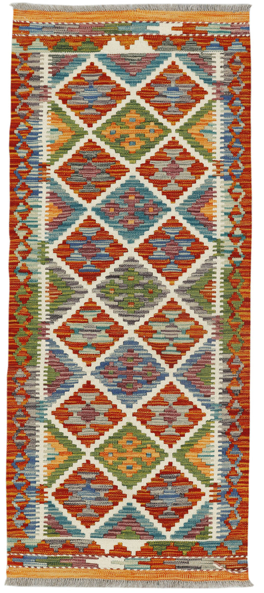 Afghan Kilim runner rug by eastofhere, 147x62cm, featuring traditional geometric patterns and vibrant woven designs.