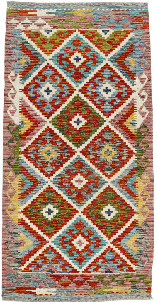 Afghan Kilim runner rug by eastofhere, 143x71cm, featuring traditional geometric patterns in vibrant colors.