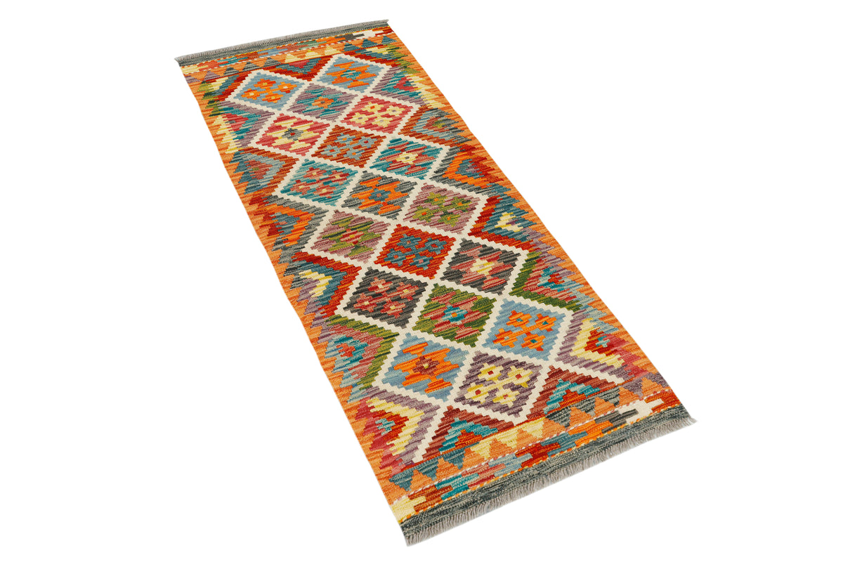 Afghan Kilim runner rug by eastofhere, 152x62cm, featuring vibrant geometric patterns and traditional handcrafted textile design.