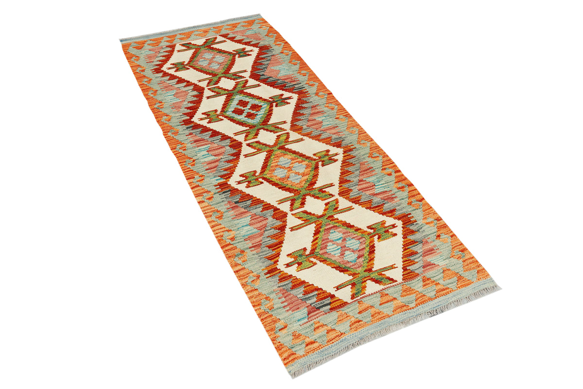 Afghan Kilim runner rug by eastofhere, 164x66cm, featuring traditional geometric patterns and vibrant colors on a woven textile.