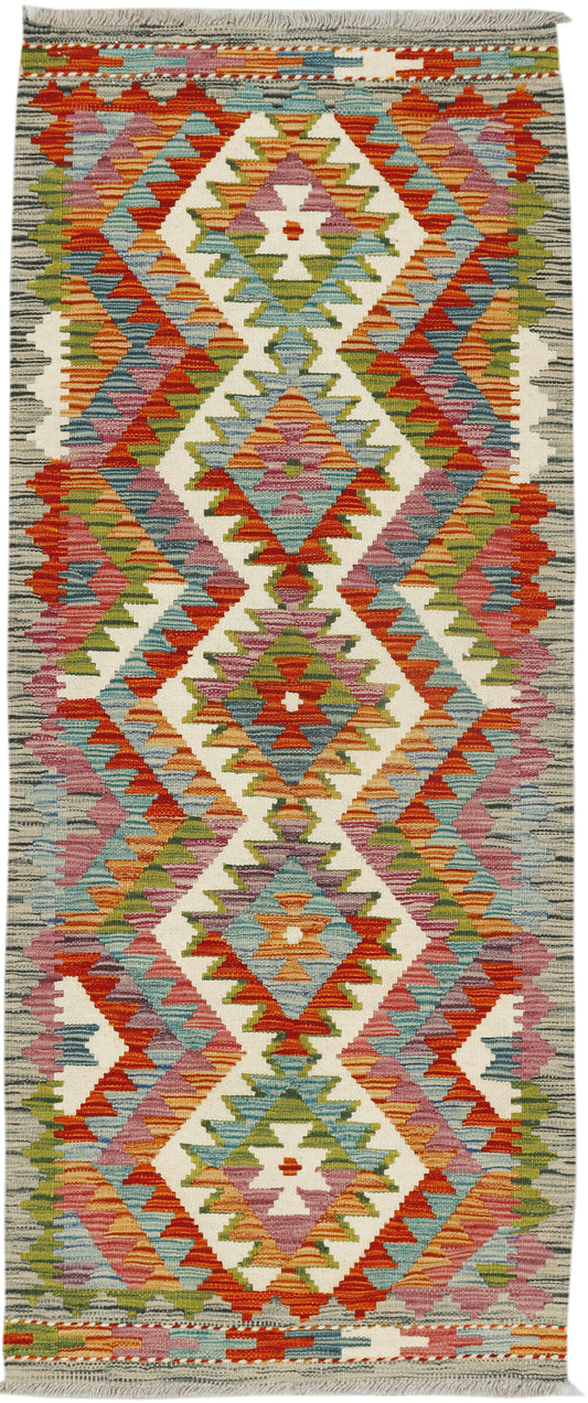 Afghan Kilim runner rug by eastofhere, 152cm x 61cm, featuring vibrant geometric patterns and traditional woven design.