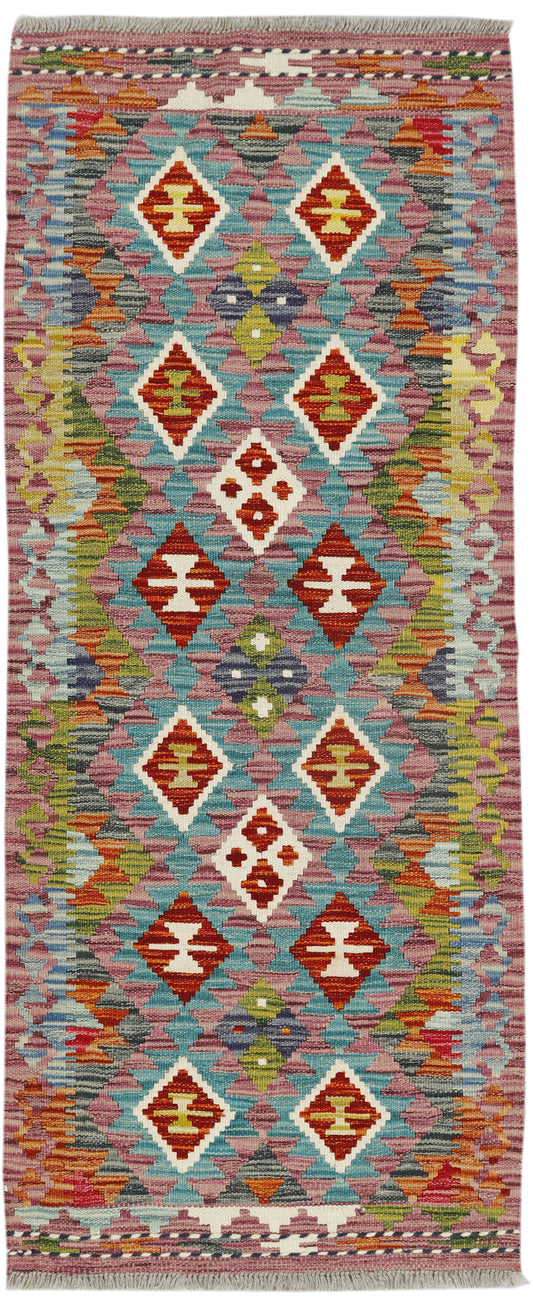 Afghan Kilim runner rug by eastofhere, 143x57cm with colorful geometric patterns on woven textile floor covering.
