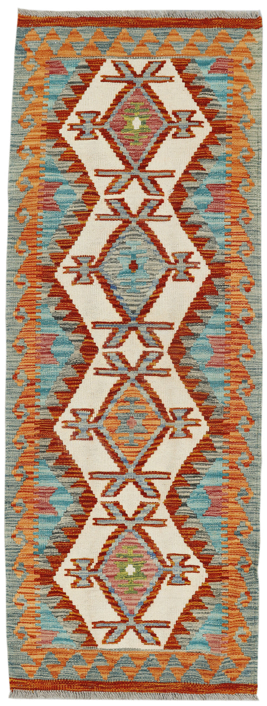 Afghan Kilim runner rug by eastofhere, 169x64cm with colorful geometric patterns on woven textile surface.