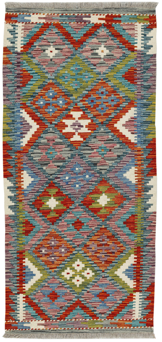 Afghan Kilim Runner rug by eastofhere featuring traditional geometric patterns in vibrant colors, measuring 142 x 64 cm.