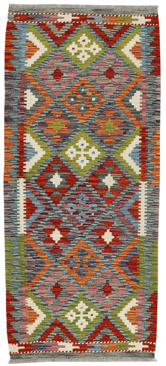 Afghan Kilim rug runner by eastofhere, 150cm x 65cm, featuring traditional geometric patterns and vibrant colors on a woven surface.
