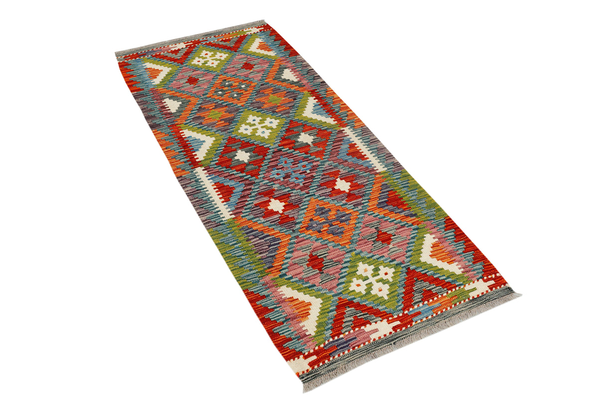 Afghan Kilim runner rug by eastofhere, 150cm long and 65cm wide, with traditional geometric patterns in vibrant colors.