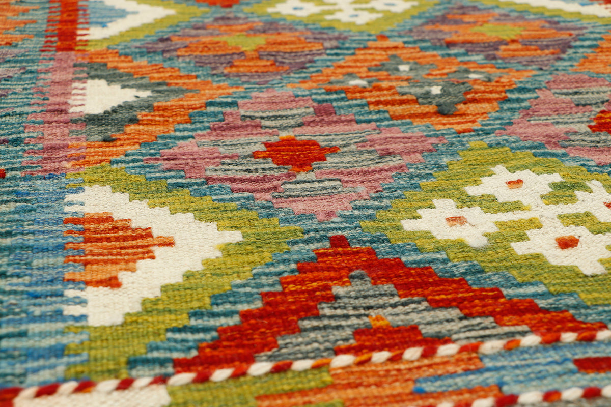 Afghan Kilim runner rug by eastofhere with intricate geometric patterns, measuring 150x65cm, vibrant traditional design.