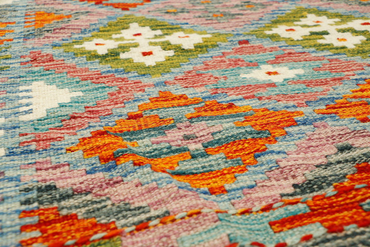 Afghan Kilim runner rug by Eastofhere, 66x153cm, featuring traditional geometric patterns and vibrant colors on woven fabric.