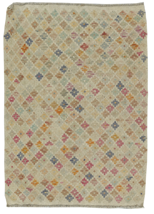 Afghan Kilim rug by eastofhere featuring geometric patterns in vibrant colors, measuring 138x99cm, traditional handwoven design.