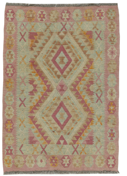 Afghan Kilim rug by eastofhere, 138 x 99cm, featuring traditional geometric patterns in vibrant colors on a woven textile.