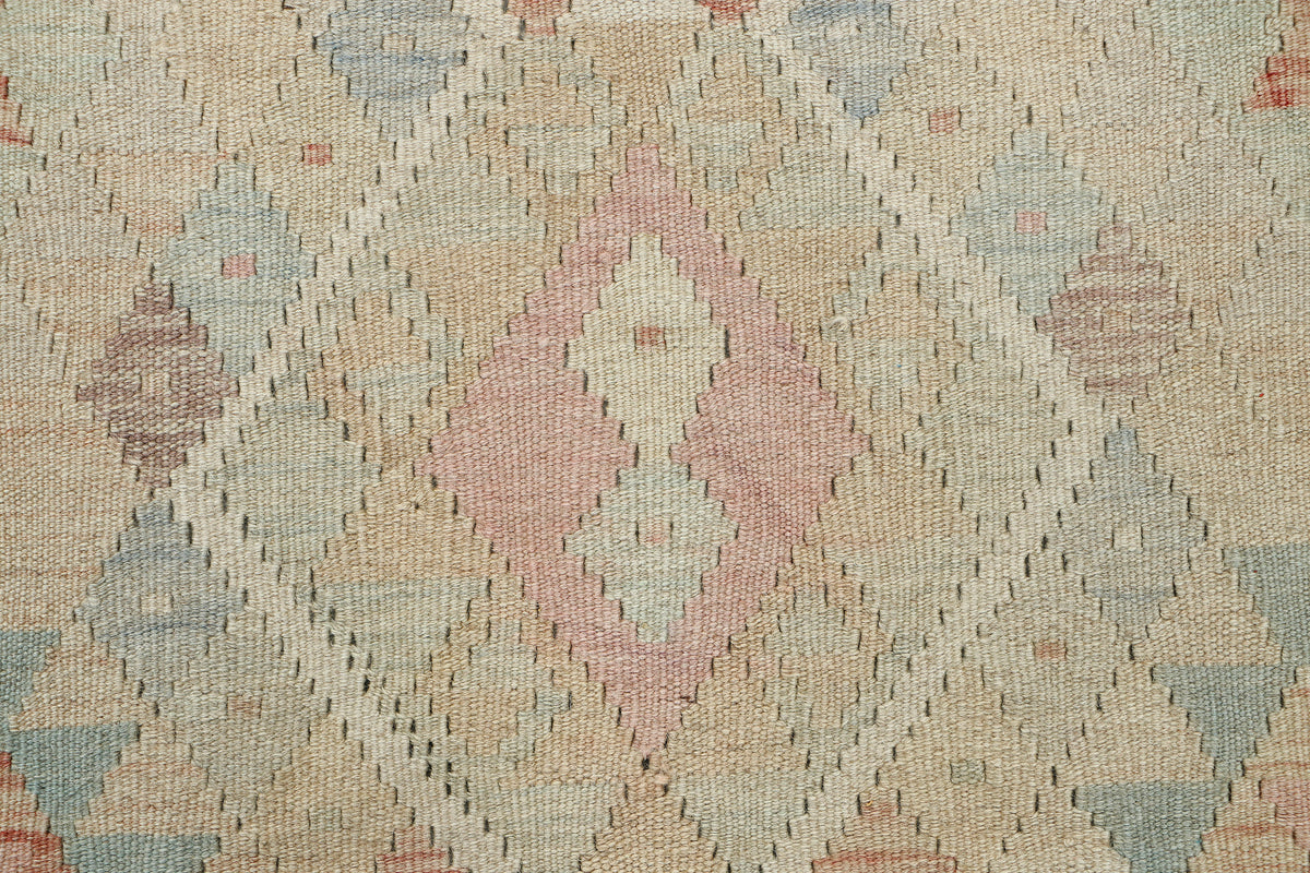 Afghan Kilim runner rug by eastofhere, 239cm long and 76cm wide, featuring traditional geometric patterns and vibrant colors.