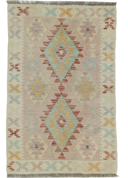 Afghan Kilim rug by eastofhere, 112x72cm, featuring vibrant geometric patterns and traditional woven design.