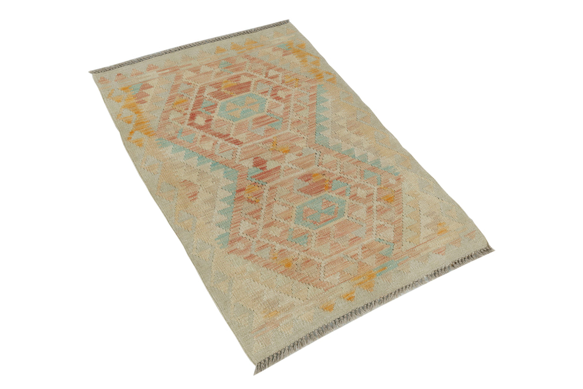 Afghan Kilim rug by eastofhere, 118x76cm, featuring traditional geometric patterns in vibrant colors.