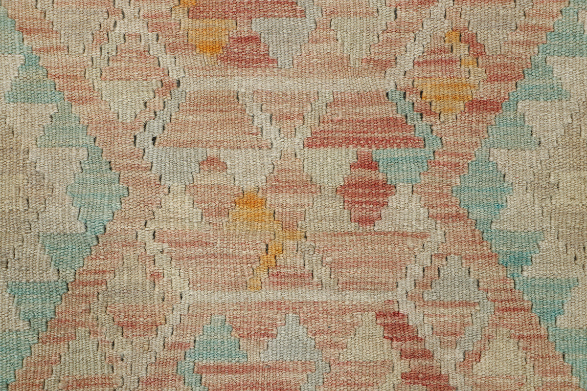 Afghan Kilim rug by eastofhere with geometric patterns in vibrant colors, measuring 118x76cm, handcrafted textile decor.