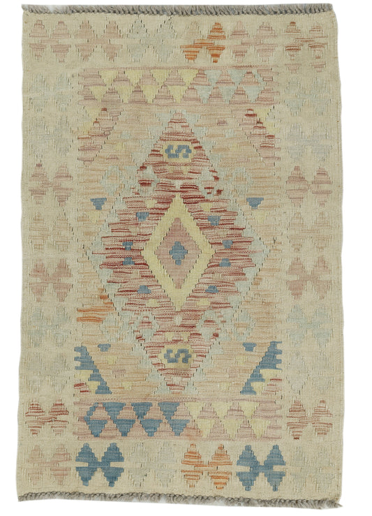 Afghan Kilim rug by eastofhere, 114x76cm, featuring traditional geometric patterns and vibrant colors on woven textile.