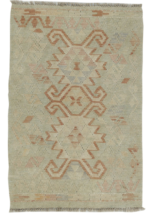 Afghan Kilim rug by eastofhere, 124x81cm, featuring traditional geometric patterns and vibrant colors on woven textile.