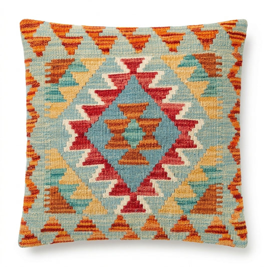 Kilim cushion with geometric pattern in red, orange, yellow, and turquoise, square shape, decorative textile by eastofhere.