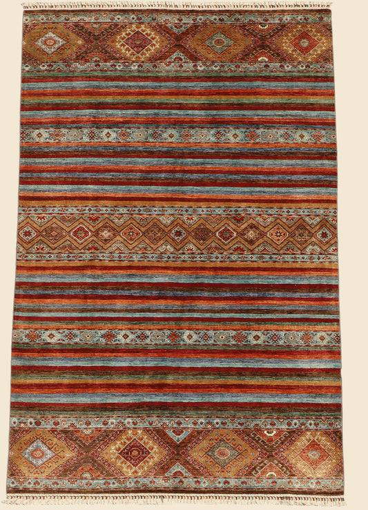 Afghan Khurjeen rug from eastofhere, 310x195cm, featuring traditional geometric patterns and vibrant colors on a woven textile.