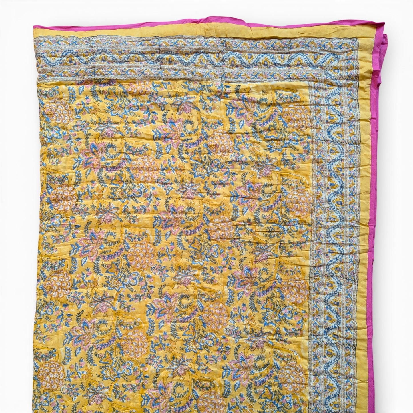 Colorful patterned fabric with yellow and blue design on a white background