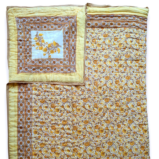 Floral patterned fabric with a decorative square featuring a tree design on a white background