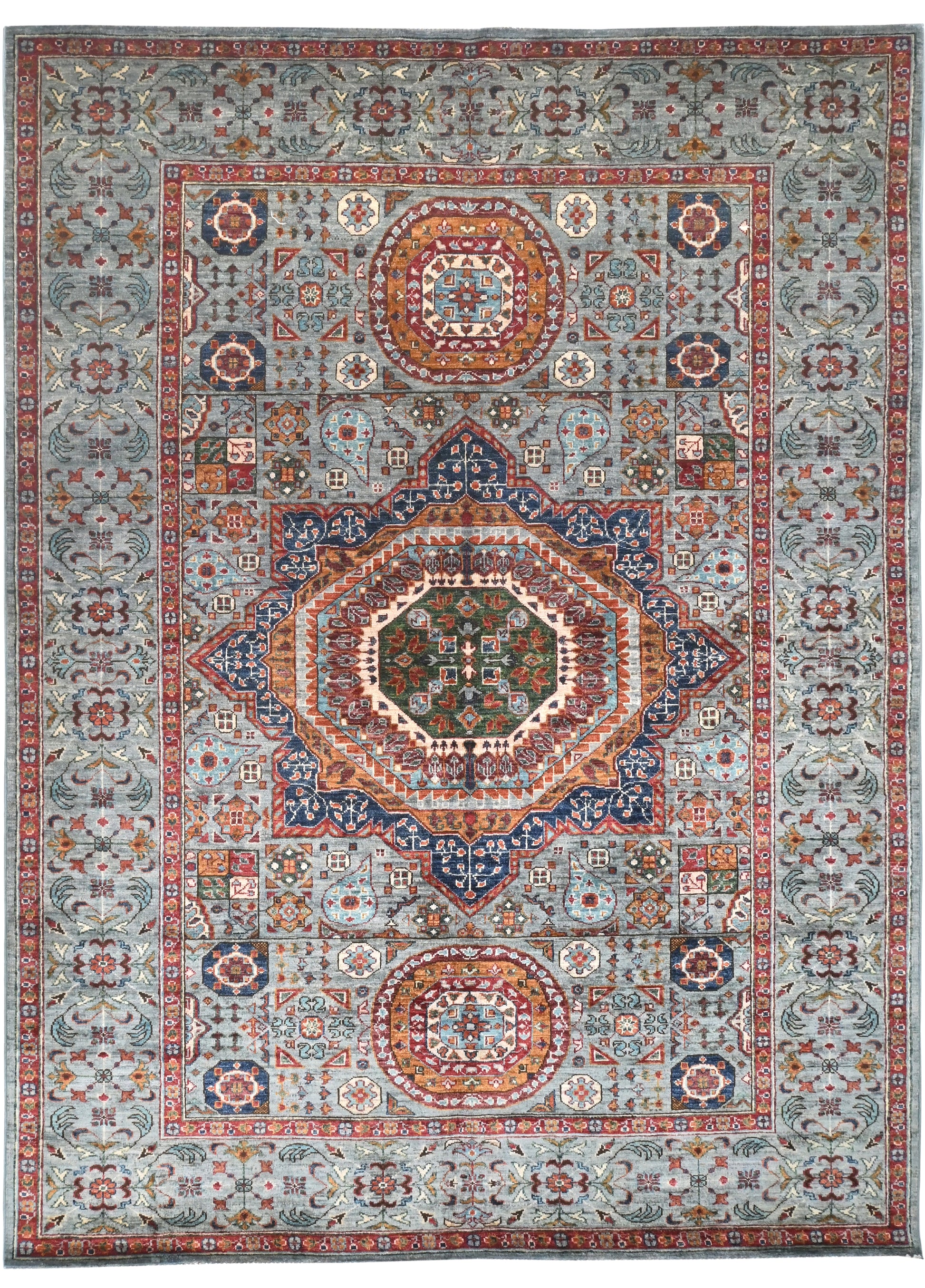 Decorative rug with intricate geometric pattern on a multicolor background