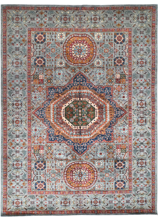 Decorative rug with intricate geometric pattern on a multicolor background